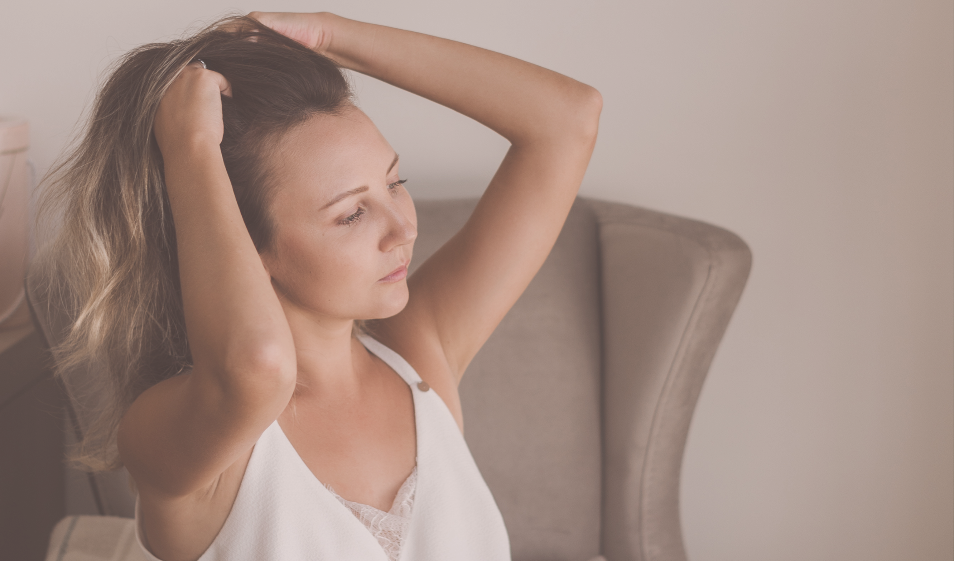 Woman  giving herself a scalp and hair massage