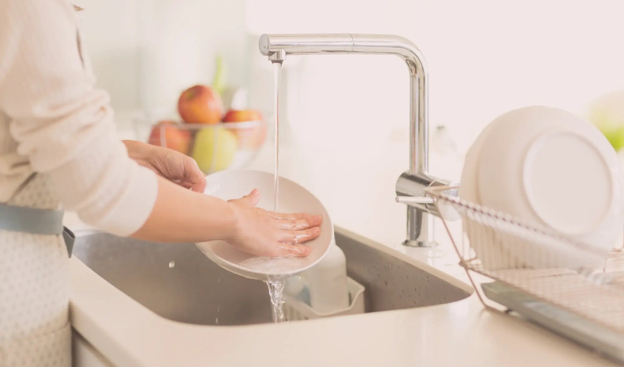 woman washing dishes