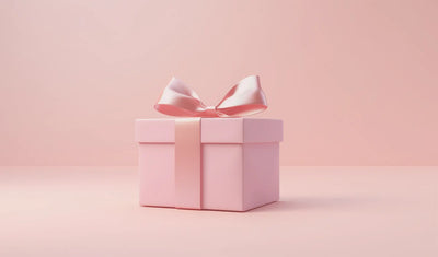 pink gift box with pink ribbon
