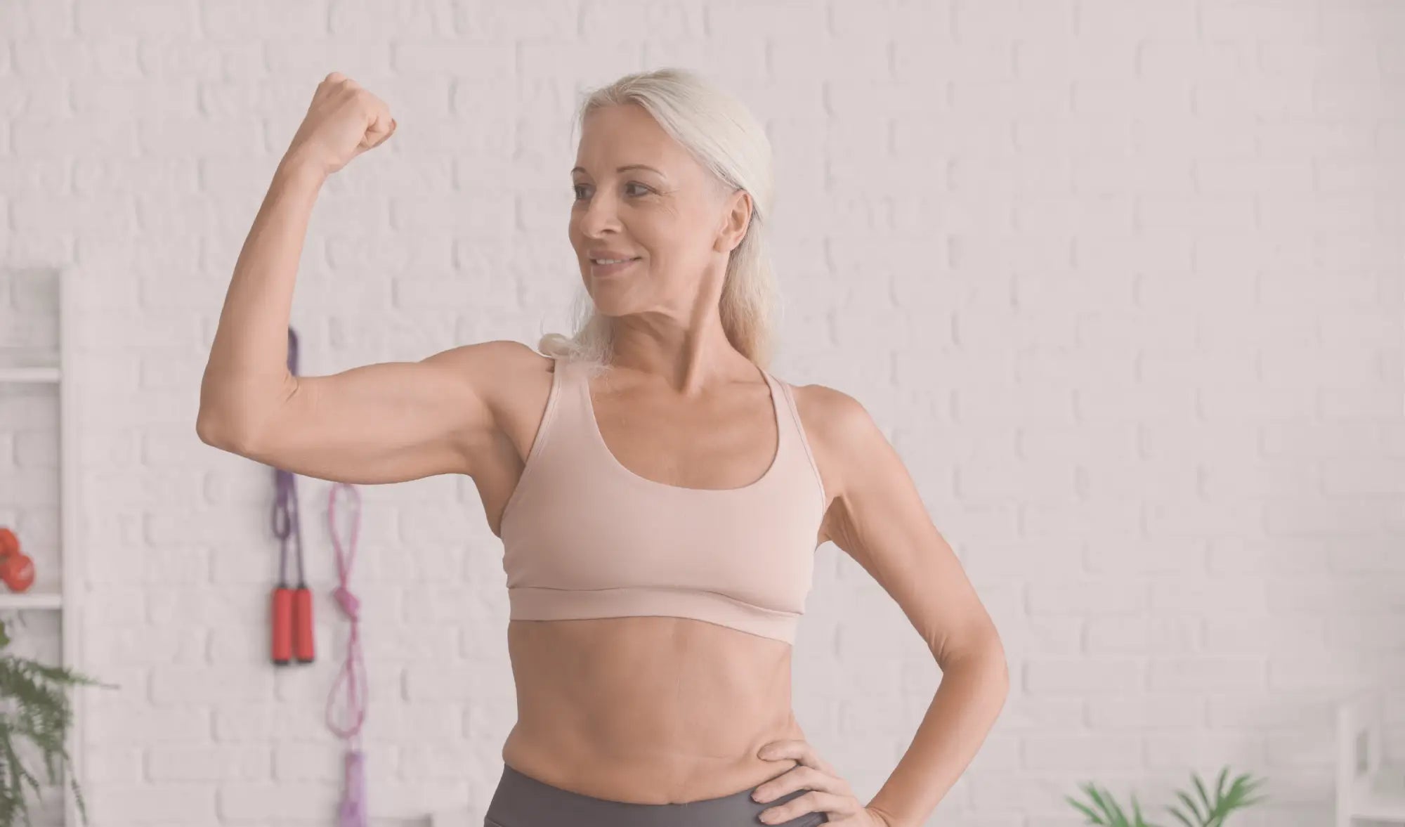 woman flexing her arm muscle