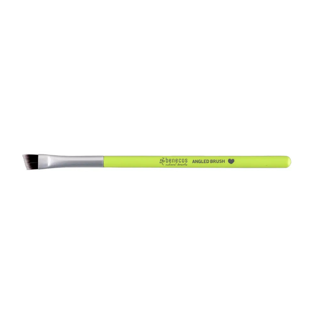 Makeup brush with a neon green handle and angled bristles.