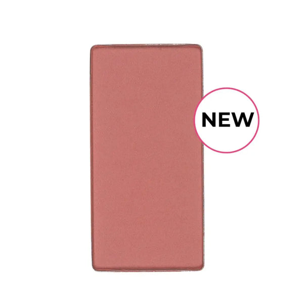 Rectangular pink makeup compact or eyeshadow pan with a ’NEW’ label.