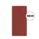 Rectangular reddish-brown object with rounded corners and a ’NEW’ label.