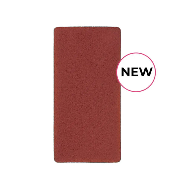 Rectangular reddish-brown object with rounded corners and a ’NEW’ label.