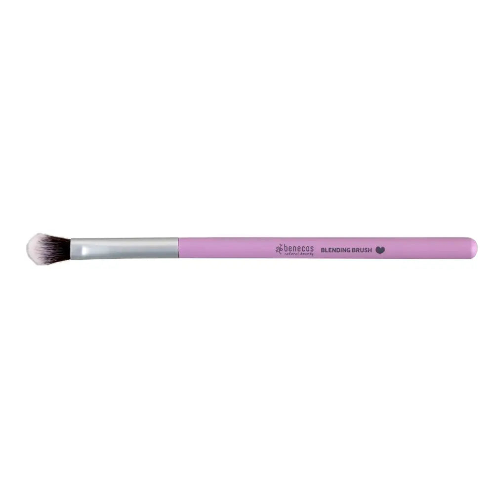 Pink and silver makeup blending brush with soft bristles.