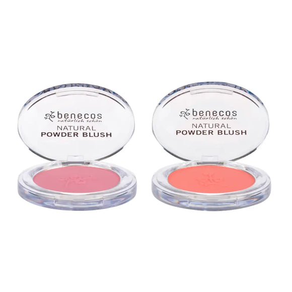 Two open compacts of Benecos natural powder blush in pink and coral shades.