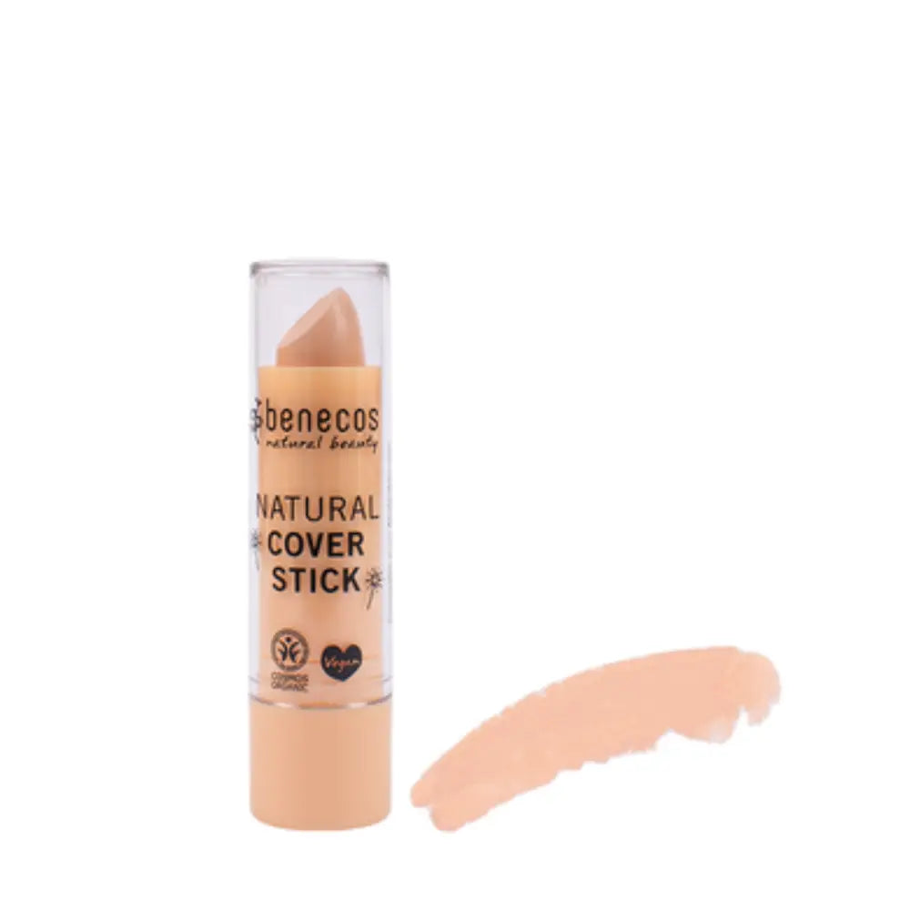 Natural beige-colored concealer stick with a swatch showing its color.