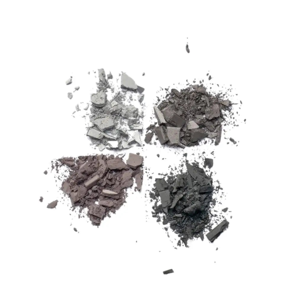 Crushed eyeshadow powders in four different gray tones.