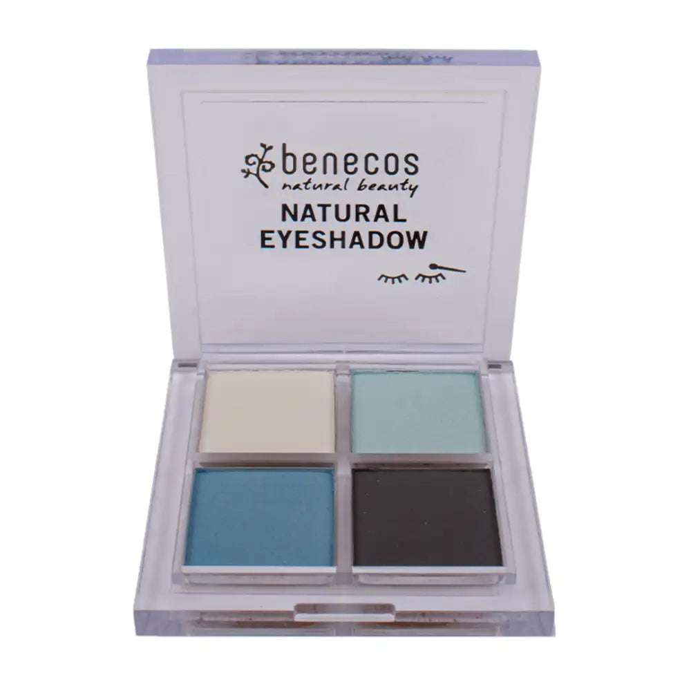 Natural eyeshadow palette containing four colors: beige, mint green, blue, and black.