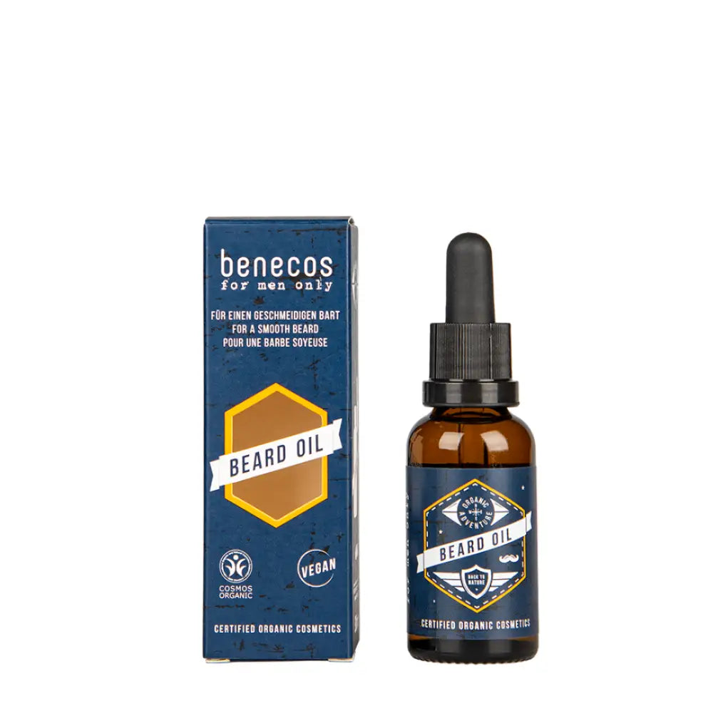 Amber glass bottle of Benecos beard oil with blue packaging box.