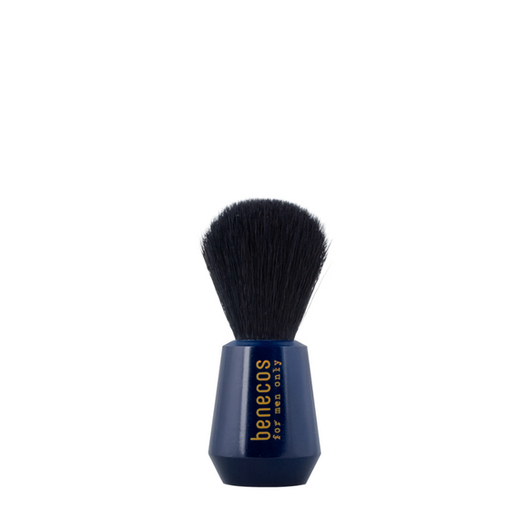 Blue-handled shaving brush with black bristles.