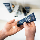 Blue tube of men’s shaving cream.