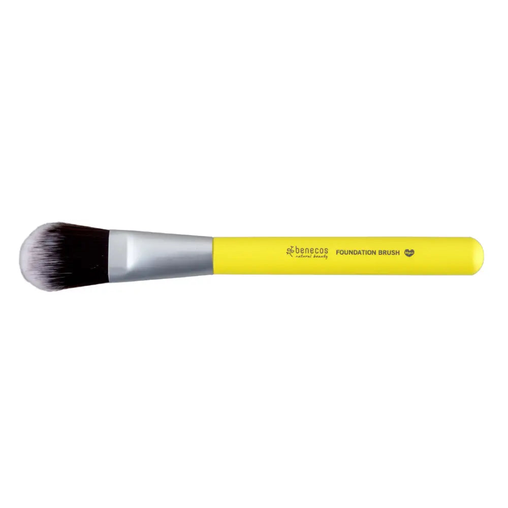 Yellow-handled makeup brush with soft black bristles and a silver ferrule.