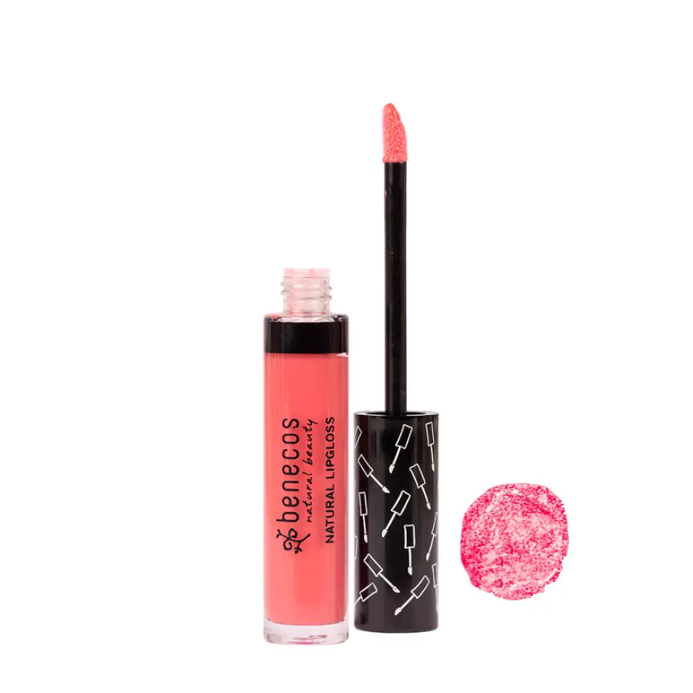 Pink liquid lipgloss in a clear tube with black cap and applicator wand.