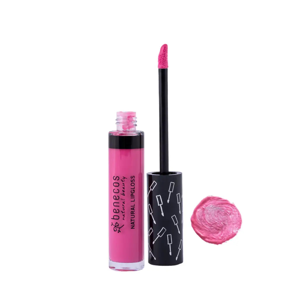 Pink liquid lipstick in a black tube with white pattern design.