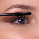 Mascara wand applying makeup.