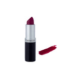 Deep burgundy lipstick in a black and silver tube with a color swatch beside it.