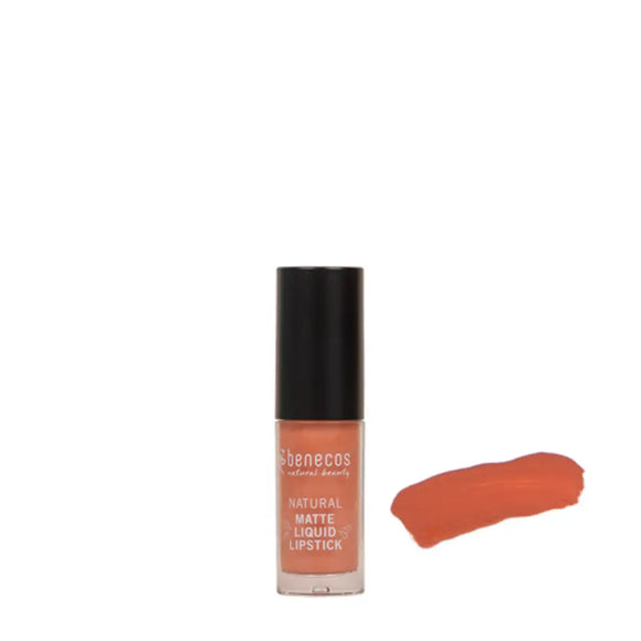 Coral-colored matte liquid lipstick with a black cap and product swatch.