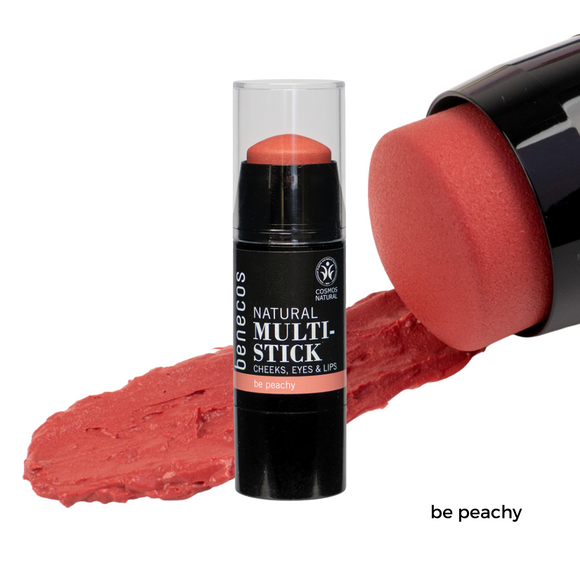 Peach-colored multi-stick cosmetic.