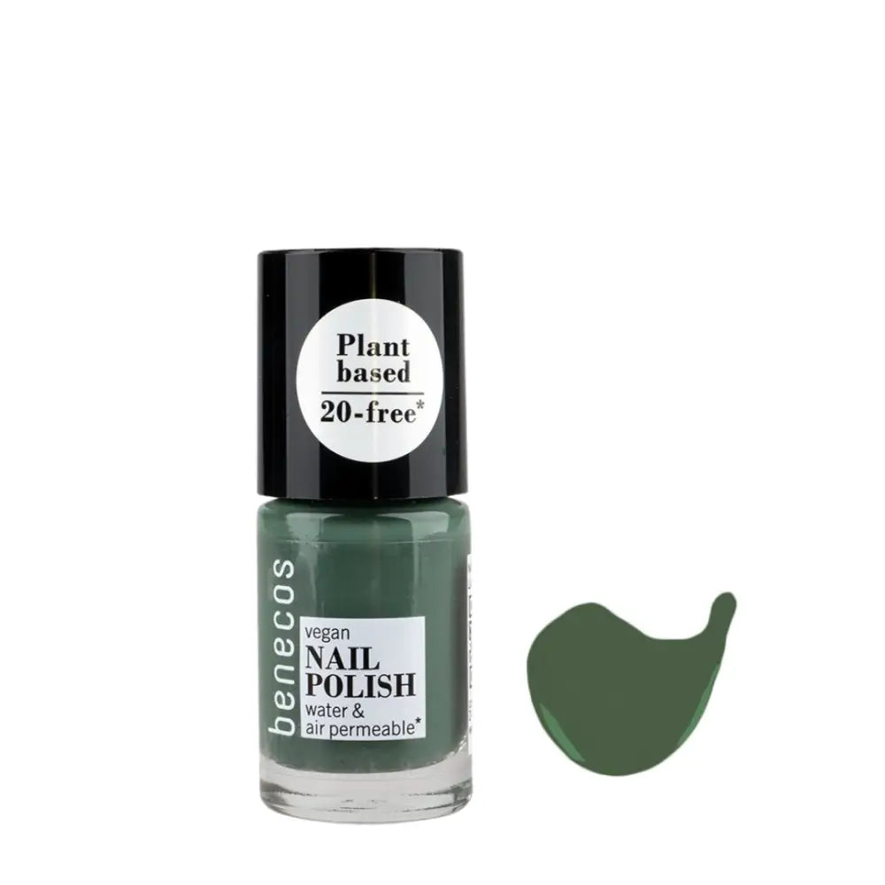 Dark green nail polish bottle with a black cap and white label.