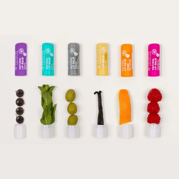 Assorted natural lip balms with corresponding ingredients.