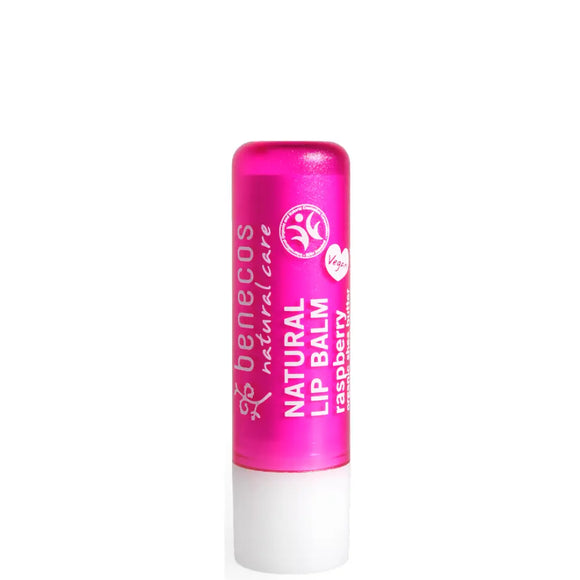 Pink natural lip balm in a cylindrical tube.