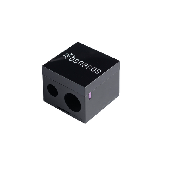Black cube-shaped pencil sharpener.