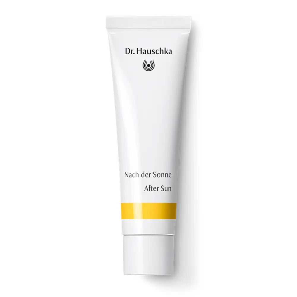 White tube of Dr. Hauschka After Sun cream with yellow accent stripes.