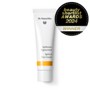 Tube of apricot day cream.