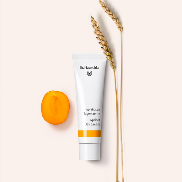 Apricot day cream tube.