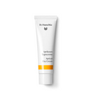 White tube of apricot day cream.