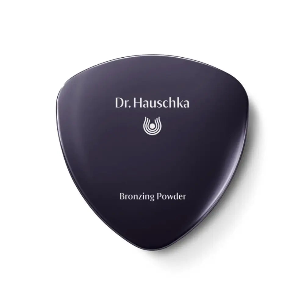 Dr. Hauschka Bronzing Powder in a triangular black compact.