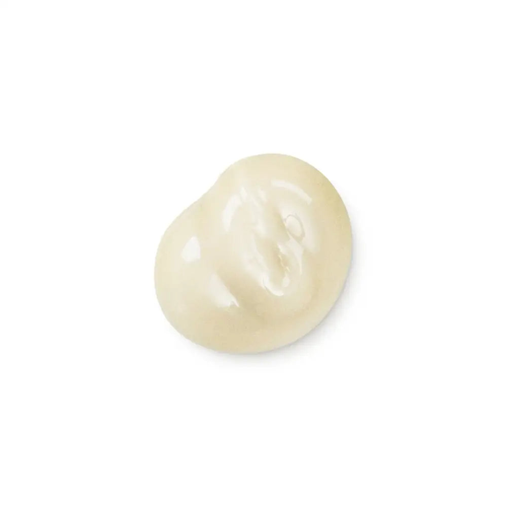 White chocolate candy bean or drop with a glossy finish.