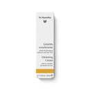 White Dr. Hauschka Cleansing Cream box with black and yellow text.