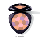 Open compact of multicolored face powder.