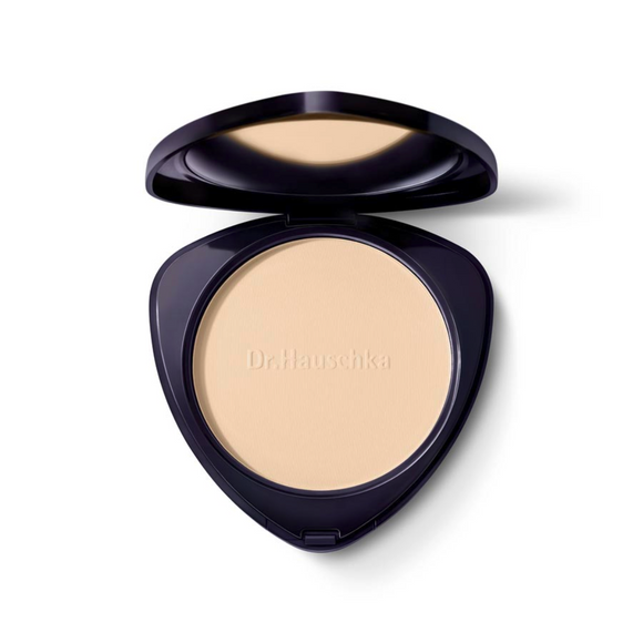 Open compact of face powder.