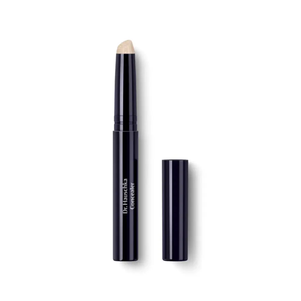 Black twist-up cream eyeshadow stick with a metallic beige color tip.