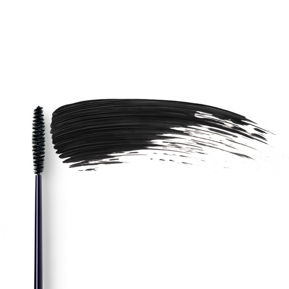 Black mascara brush and smear.