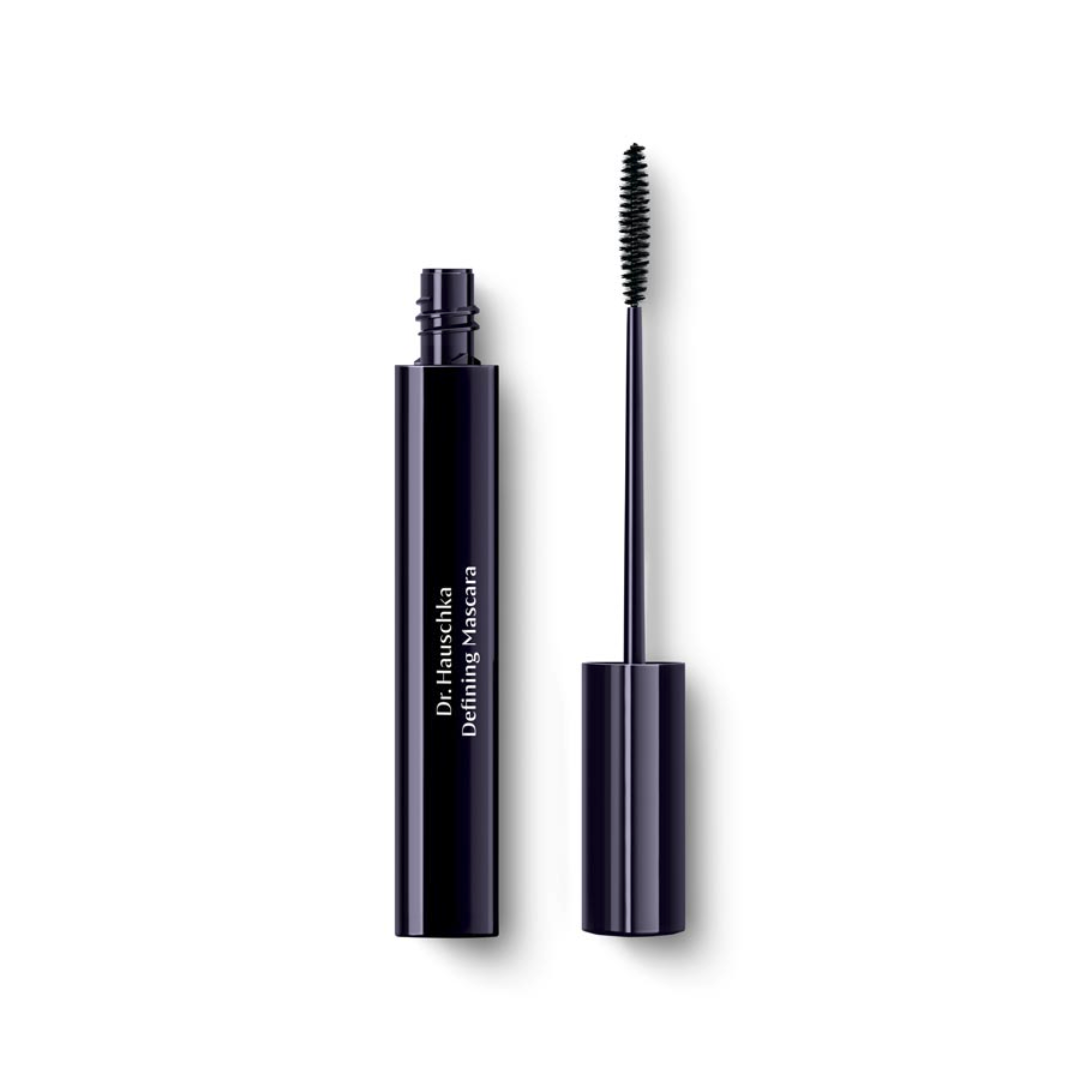 Open tube of dark blue mascara with wand.