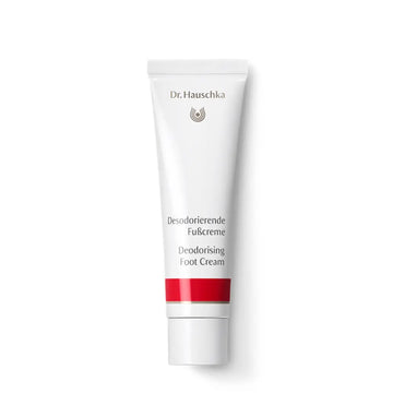 White tube of Dr. Hauschka Deodorizing Foot Cream with a red stripe.
