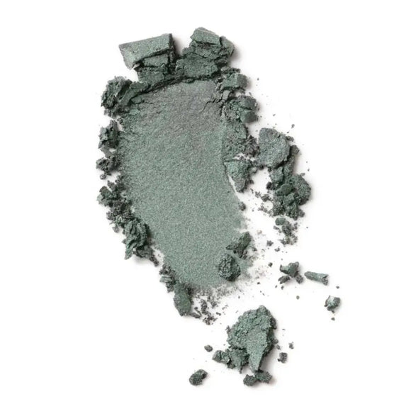 Crushed sage green eyeshadow powder with a metallic sheen.