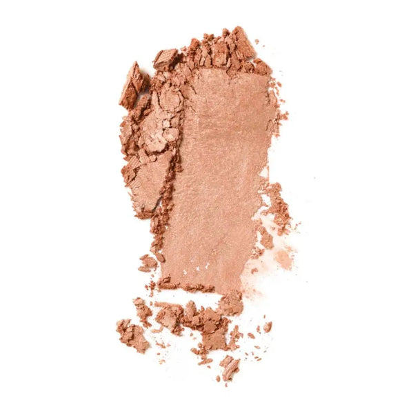 Crushed peachy-pink powder makeup with a soft, shimmery texture.