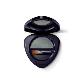 Black compact case containing gray eyeshadow and a small makeup brush.