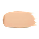 Peach-colored makeup foundation smear with a soft gradient edge.