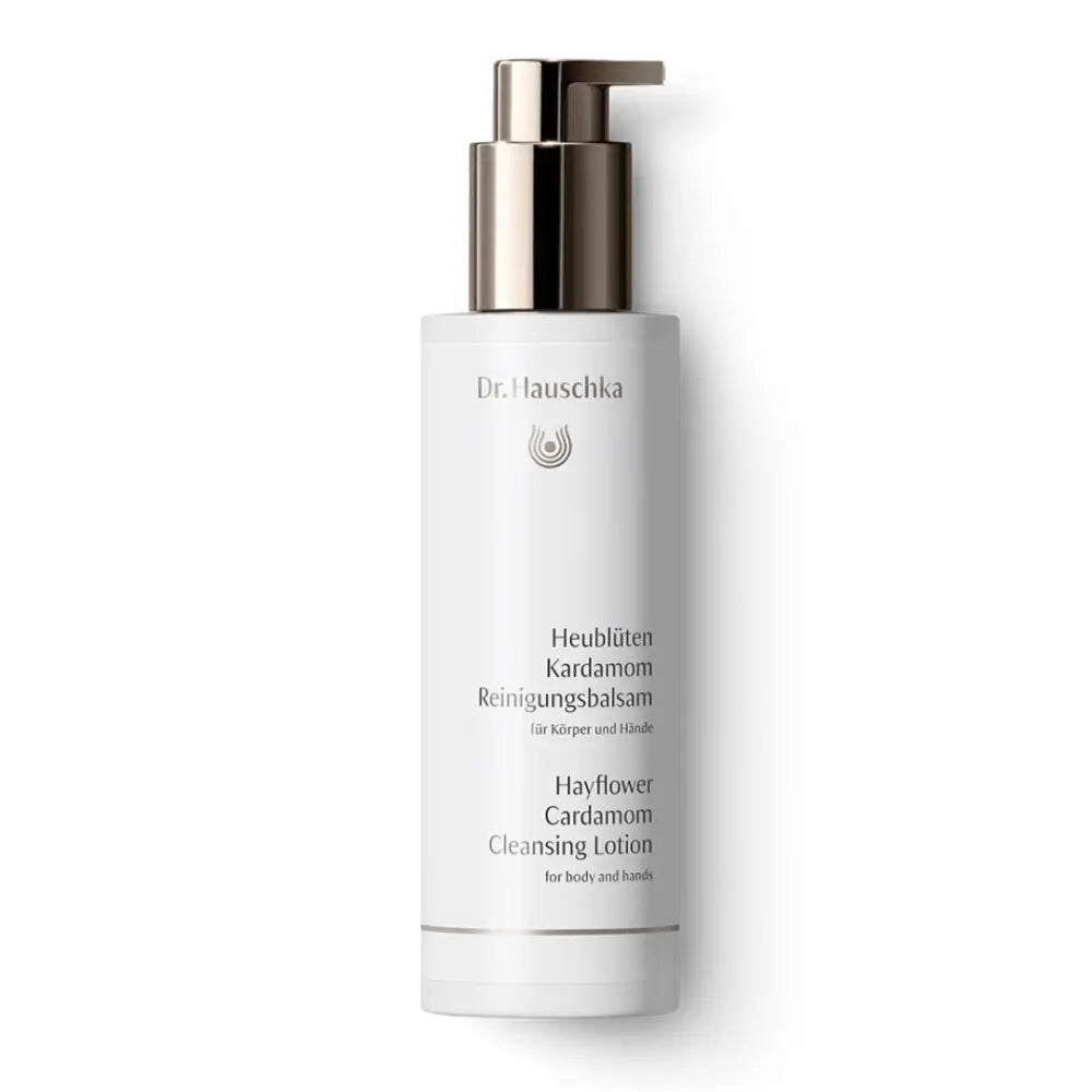 White bottle of Dr. Hauschka Hayflower Cardamom Cleansing Lotion with a silver pump dispenser.