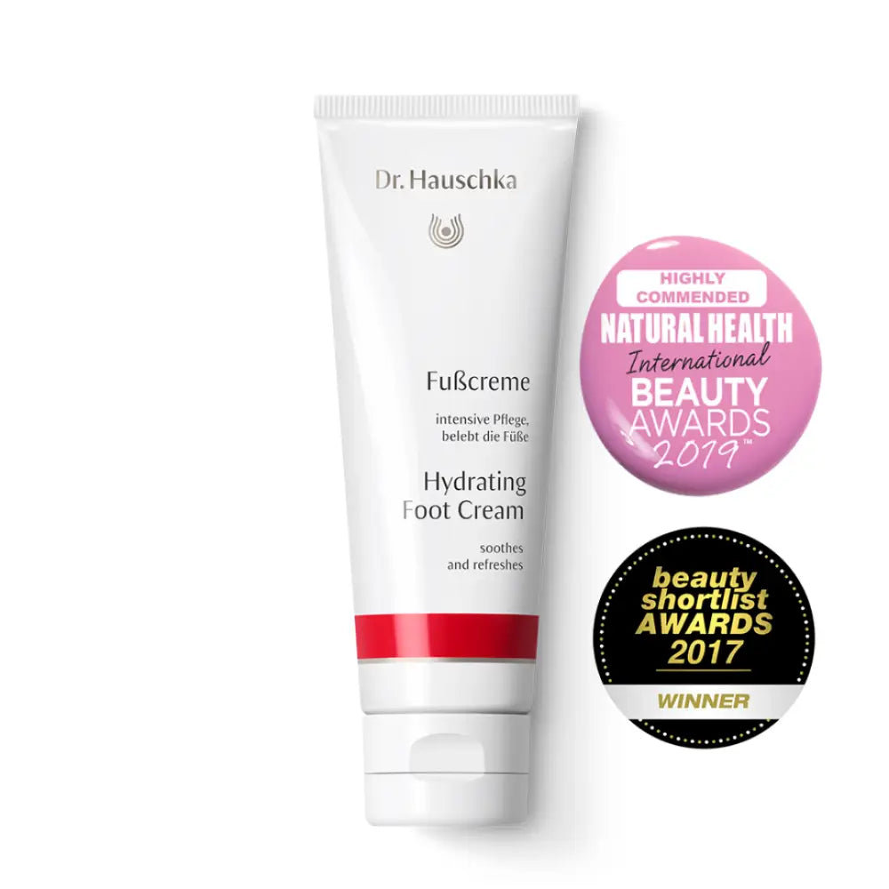 Dr. Hauschka Hydrating Foot Cream tube with two beauty award badges.