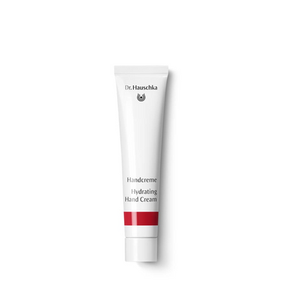 White hand cream tube with red stripe.