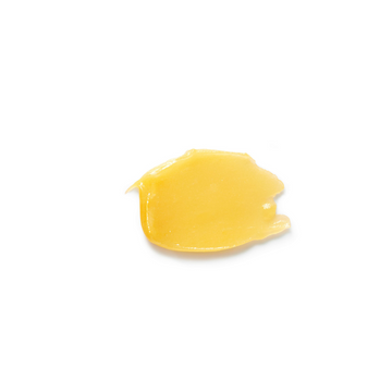 Yellow cosmetic smear.