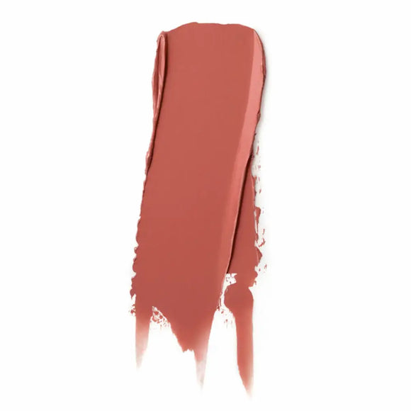 Peach-toned lipstick smear with a soft, blended edge.
