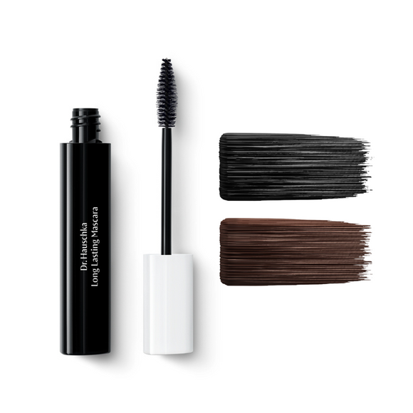Two shades of Dr. Hauschka Long Lasting Mascara, one black and one brown.